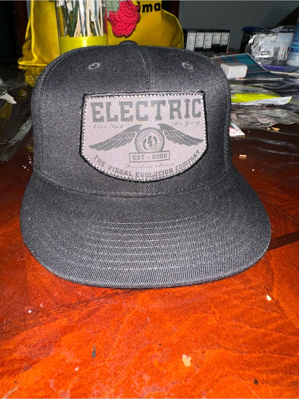 Electric Family Black Flat-Brim Snapback Hat with Front Patch